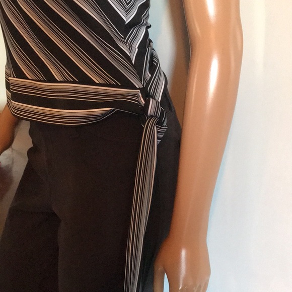 Black and white top. Tie at the hip for looks. Size small - Picture 2 of 4